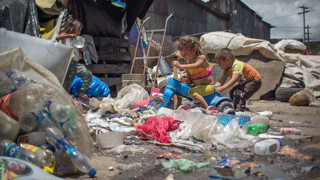 Children Playing at the Terminal Dump in Guatemala City. Photo by Scott Owen Moore.