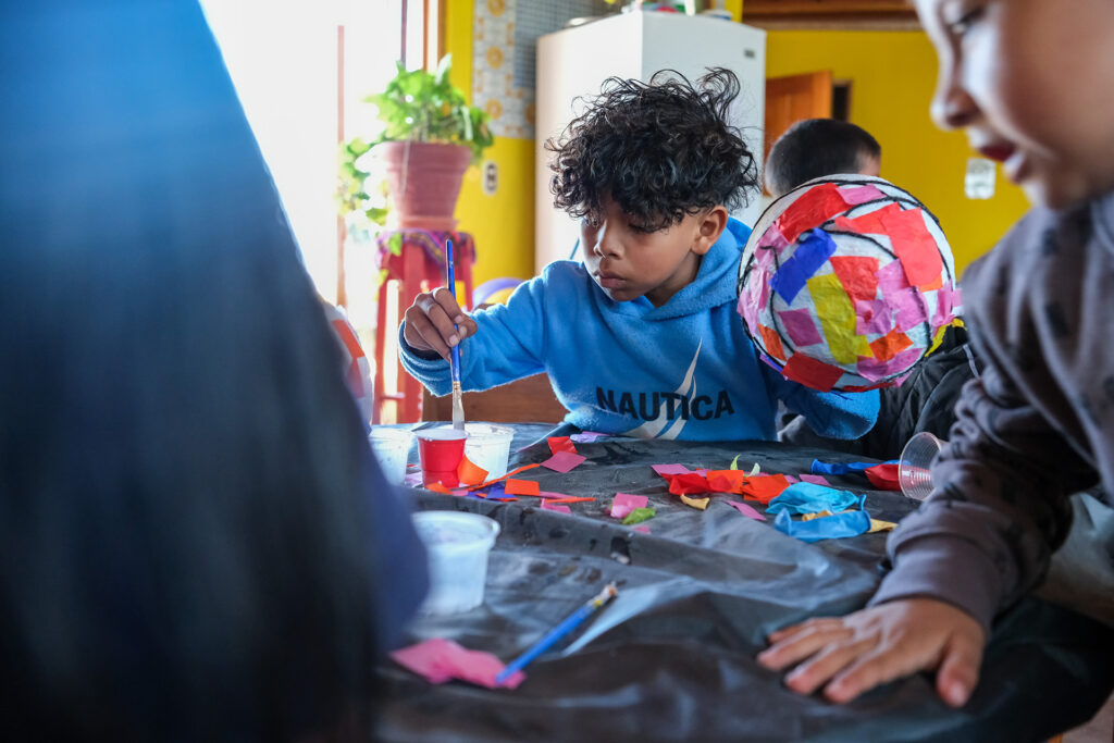Opal House Summer 25 Preschool Workshop students working on their lanterns.