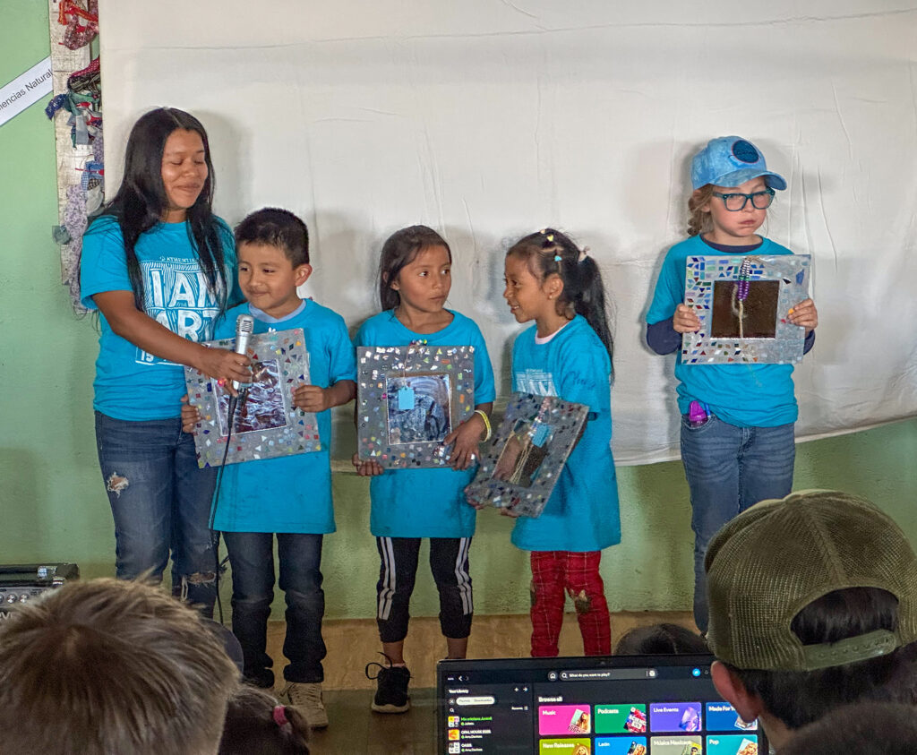 Opal House Summer 25 Preschool Workshop Students sharing their project at the art show.